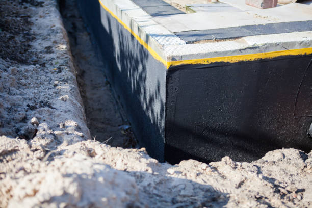Professional Waterproofing technician working in Memphis, IN